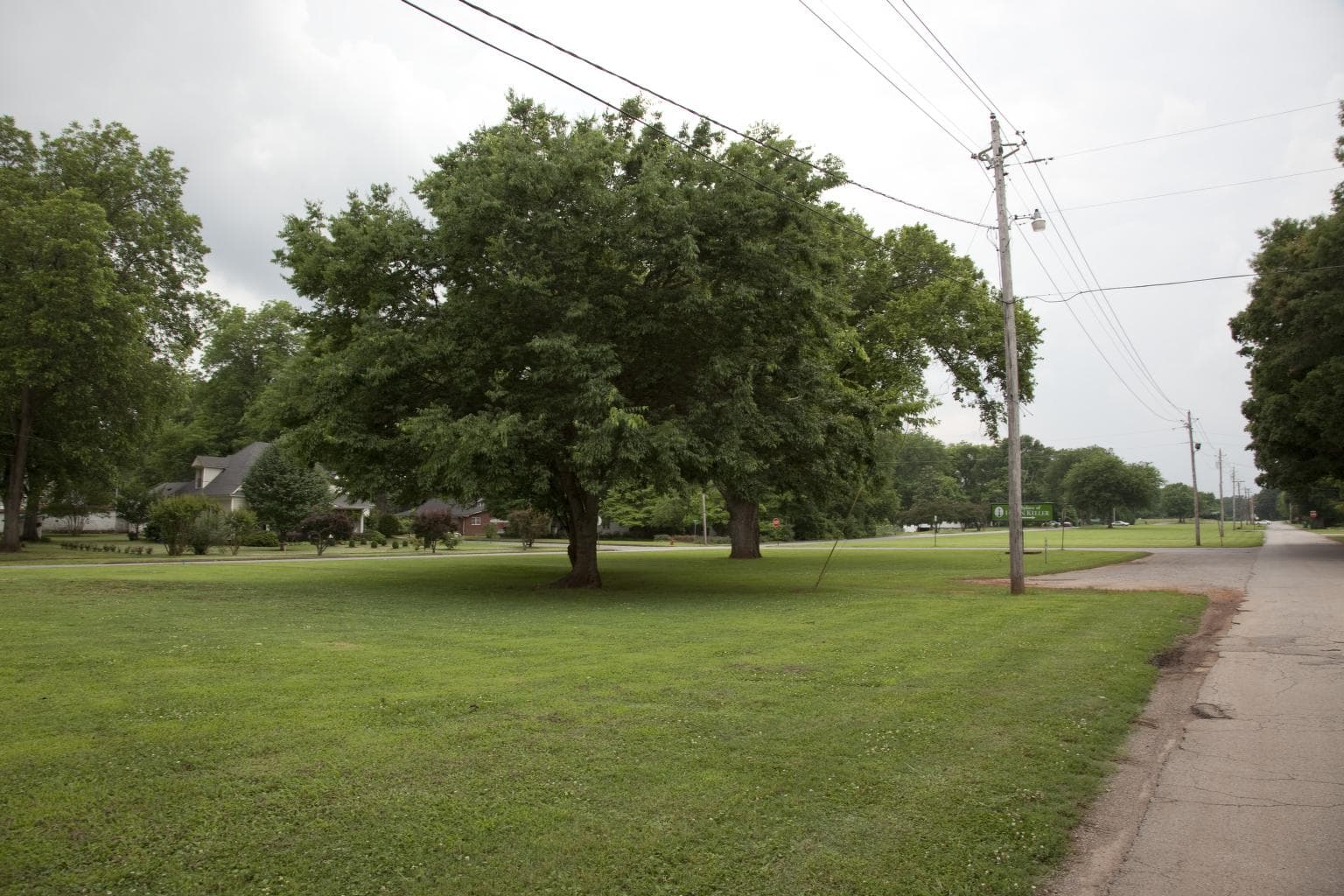 A broad lawn gives historic Tuscumbia, Alabama, a quiet shared center.