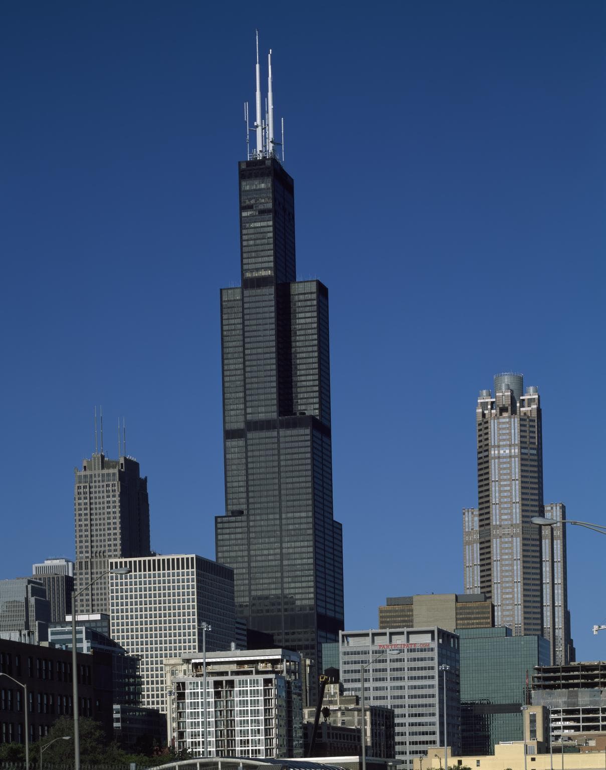 Chicago's tallest landmark rises from a canyon of downtown buildings.