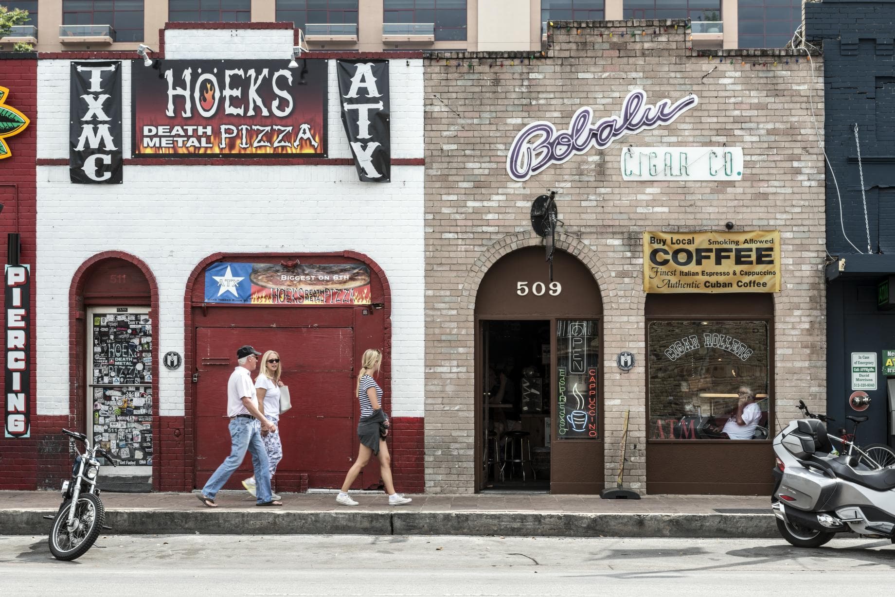 Austin's famous entertainment strip packs music, signs, and street life into one frame.
