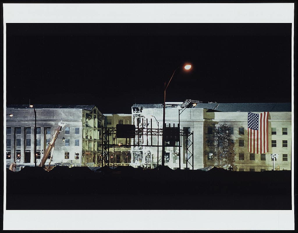 The Pentagon at night on 22 September 2001, illuminated and under repair